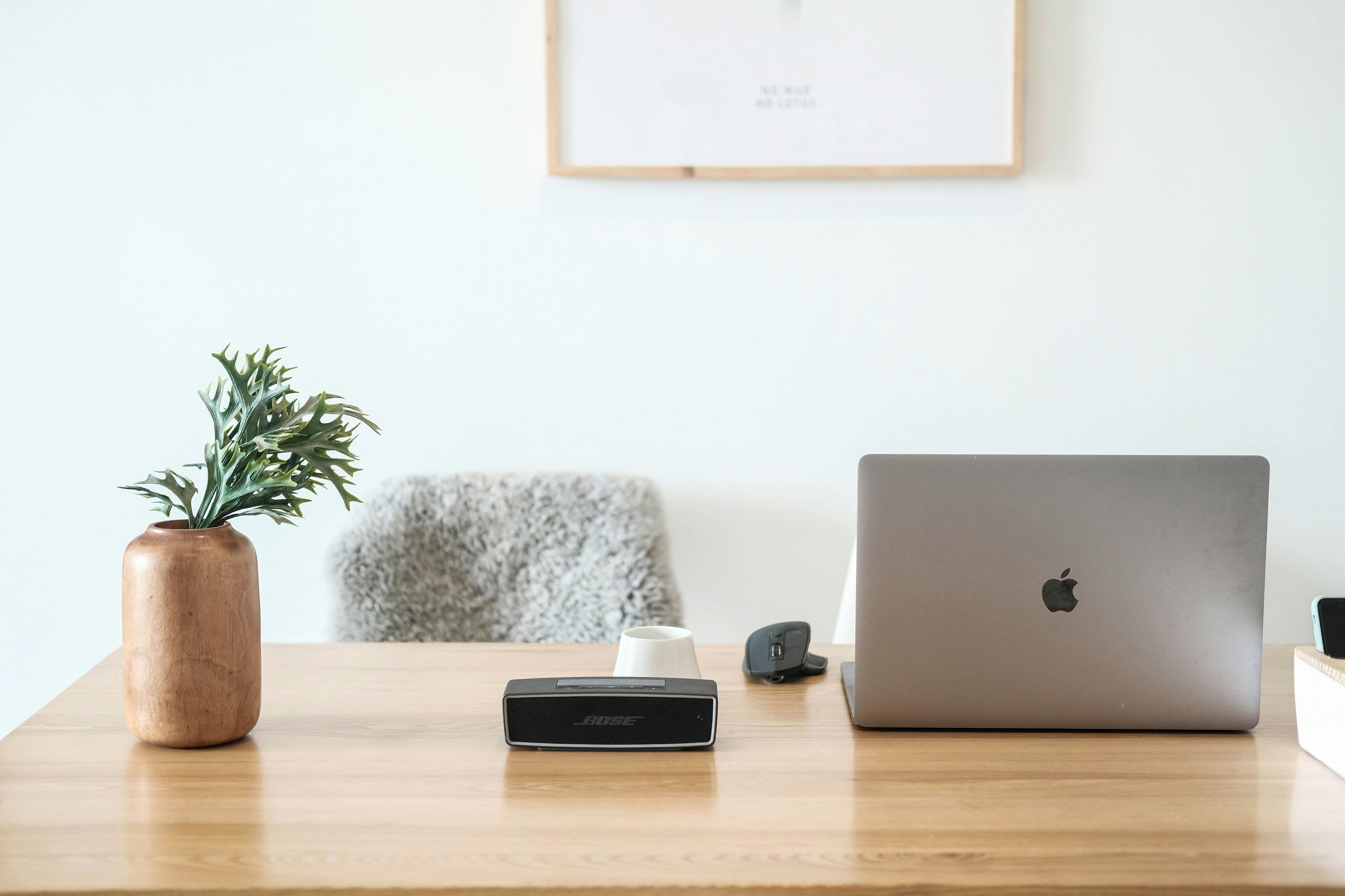 A Wi-Fi router on a shelf in a home office